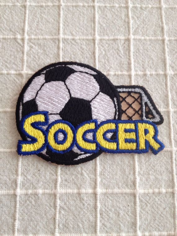 Iron-on custom soccer patch on a jersey
